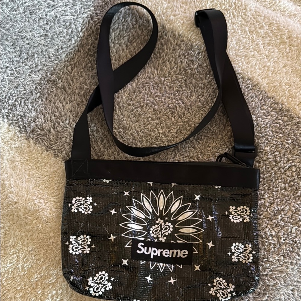 Supreme cross body bag with adjustable strap. Lots of life left!!